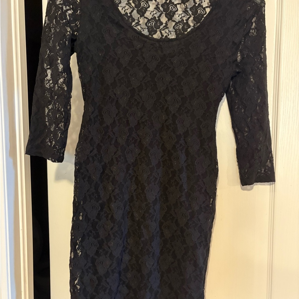 Guess cocktail black dress. Size medium. Lace detail floral.